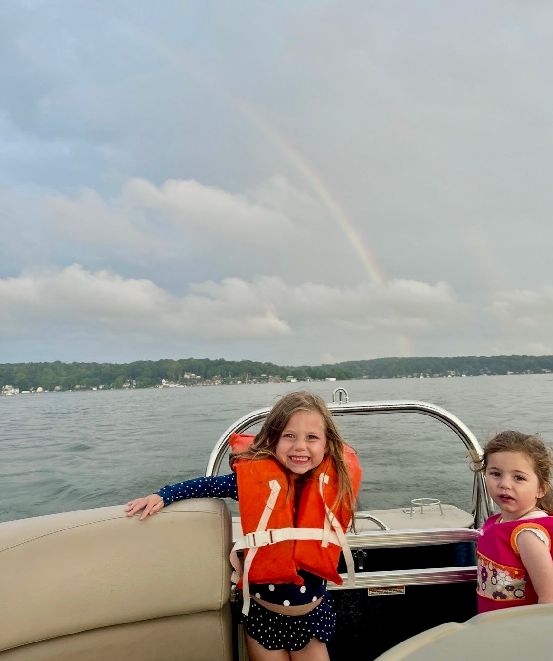 Life jackets on boat.  Safety first.